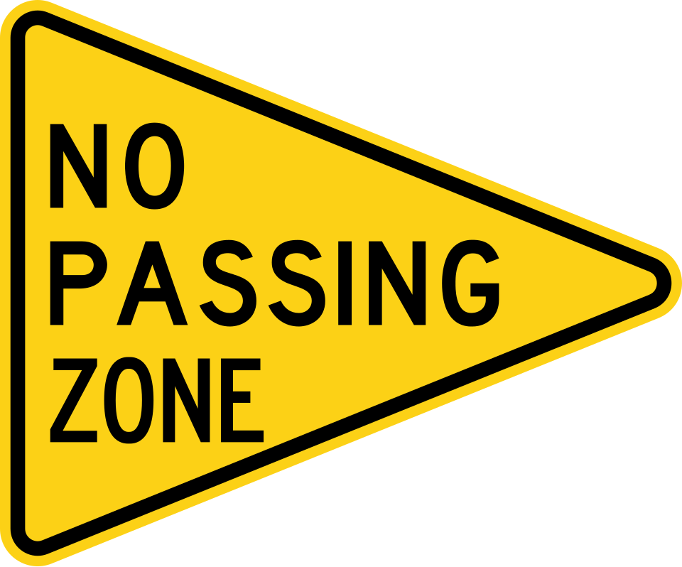 Yellow pennant shaped no passing zone sign, MUTCD code W14-3, a horizontal triangle pointing right