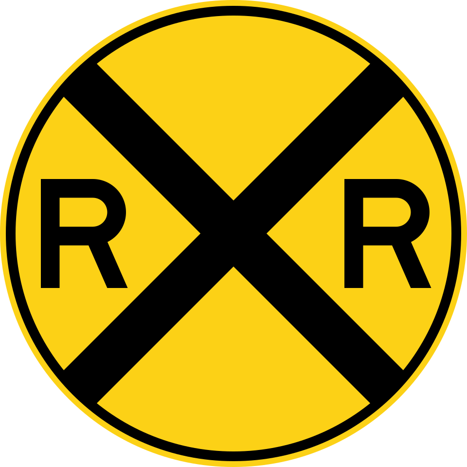Round yellow railroad advance warning sign, MUTCD code W10-1, with a black X and two R letters