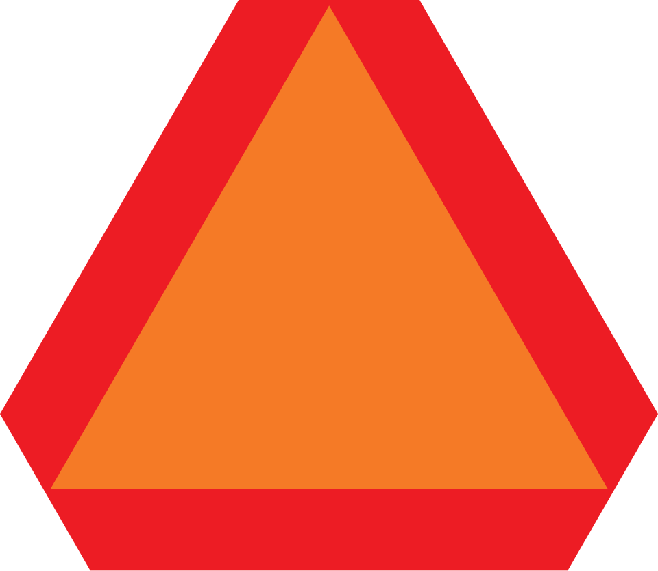 Slow moving vehicle emblem, a fluorescent orange triangle with a dark red reflective border, displayed on vehicles built for 25 mph or less